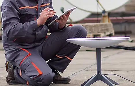 Home 8 men installing satellite internet